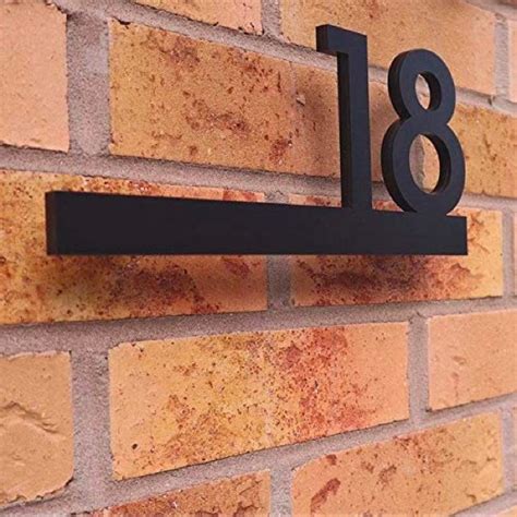 custom house numbers metal black floating on brick wall|brick house numbers template.